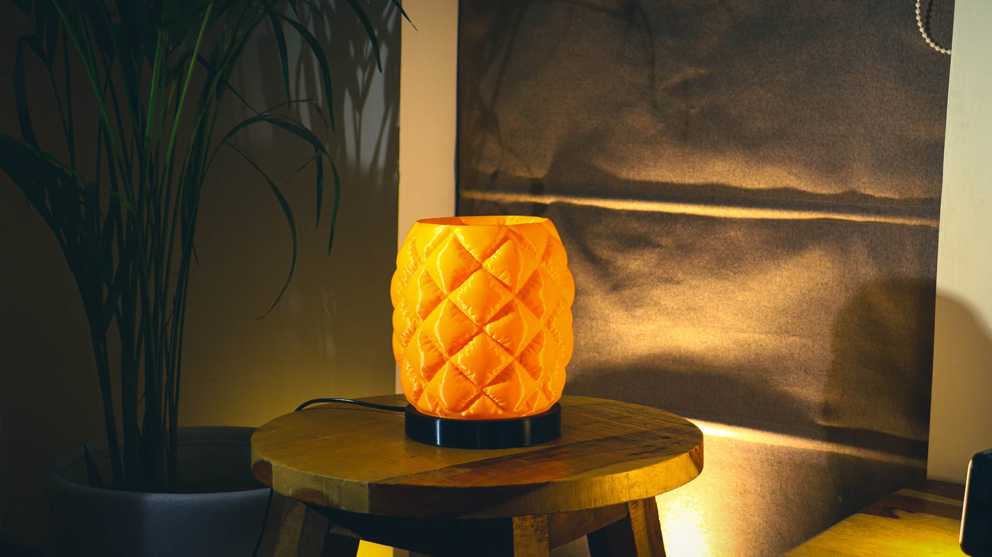 Quilted puffer-style table lamp, orange finish, cylindrical shape